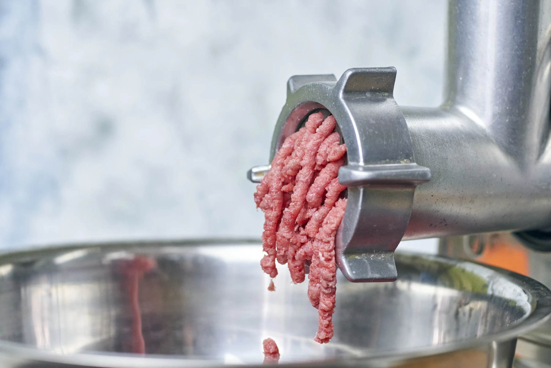 freshly-ground-meat-coming-out-of-grinder-2026-03-18-08-12-46-utc